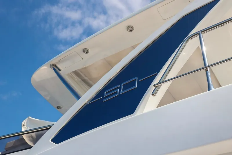 Slide: The Image of 2023 Azimut Fly 50 yacht detail against blue sky background. - 40