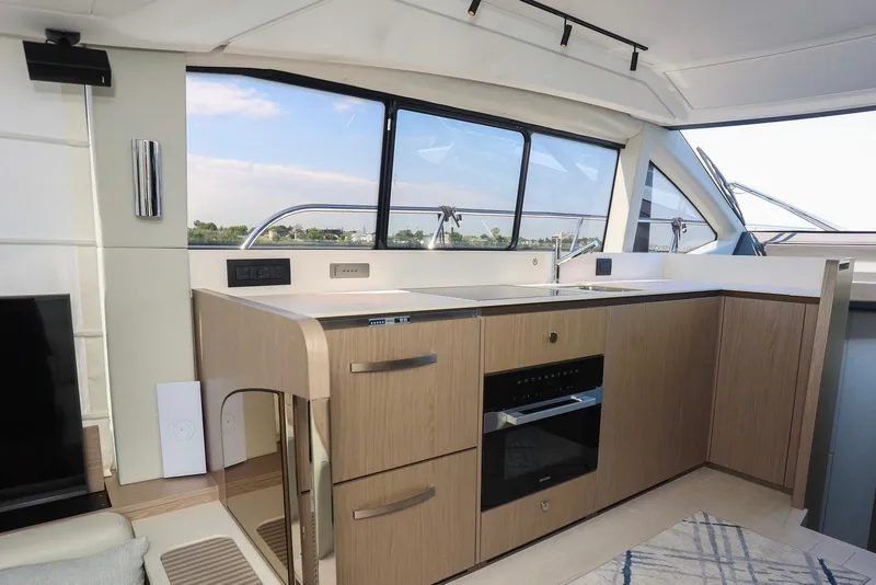 Slide: The Image of Modern kitchen interior of 2023 Azimut Fly 50 yacht with sleek cabinetry and appliances. - 12