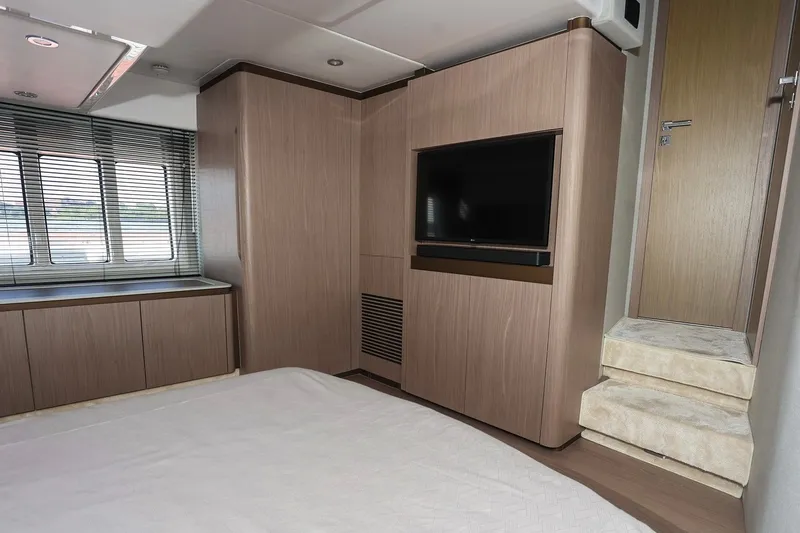 Slide: The Image of Luxurious interior of 2023 Azimut Fly 50 yacht with modern wood finishes and flat-screen TV. - 45