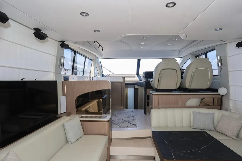 Slide: The Image of Luxurious interior of 2023 Azimut Fly 50 yacht with modern seating and navigation area. - 55