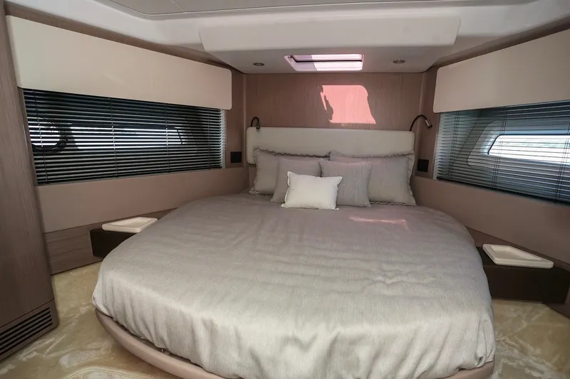 Slide: The Image of Luxurious bedroom interior of 2023 Azimut Fly 50 yacht with elegant bedding and modern design. - 33