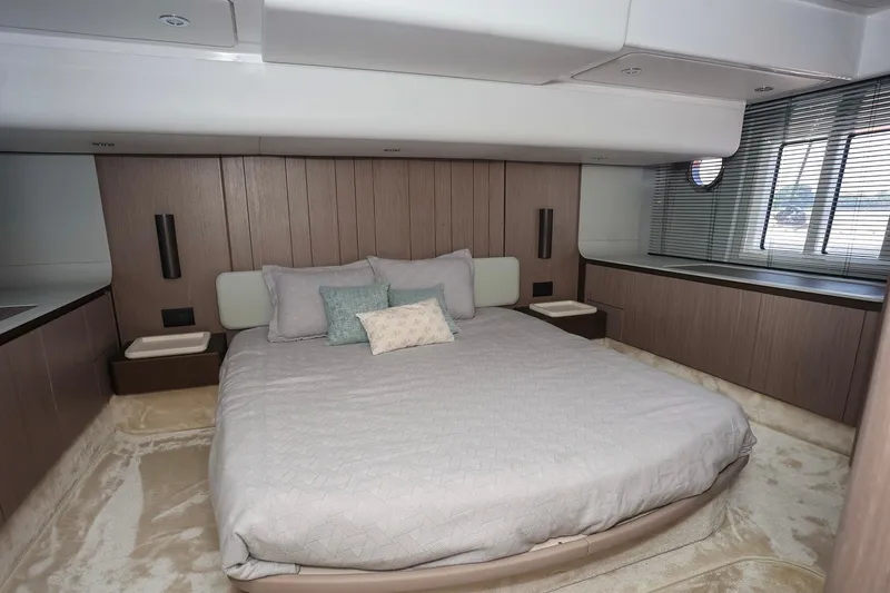 Slide: The Image of Luxurious bedroom interior of 2023 Azimut Fly 50 yacht with modern design and cozy bedding. - 42