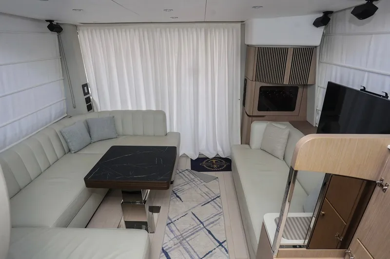 Slide: The Image of Luxurious interior of 2023 Azimut Fly 50 yacht with elegant seating and modern decor. - 13