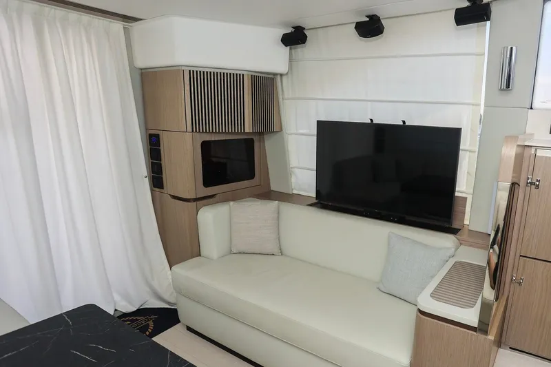 Slide: The Image of Luxurious interior of 2023 Azimut Fly 50 yacht with modern sofa and flat-screen TV. - 27