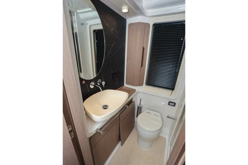 Slide: The Image of Luxurious bathroom in 2023 Azimut Fly 50 yacht with modern fixtures and elegant design. - 41