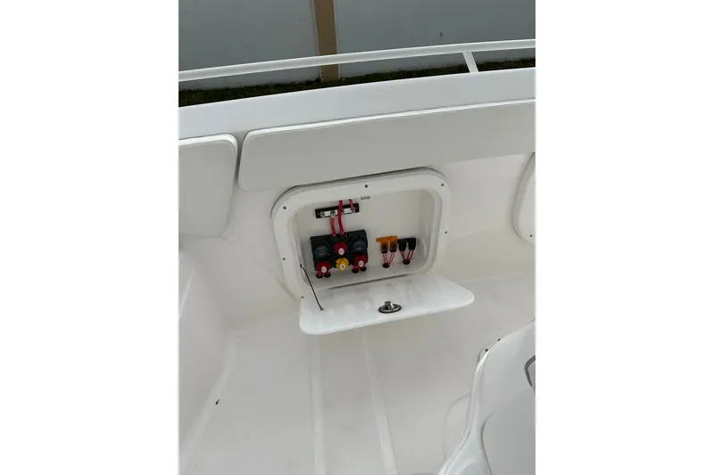 Slide: The Image of 2025 Glasstream 280 Pro-XS boat interior with open electrical panel. - 20