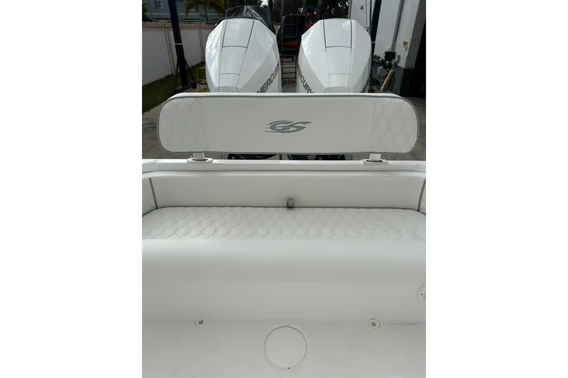 Slide: The Image of 2025 Glasstream 280 Pro-XS boat with dual Mercury engines and cushioned seating. - 14