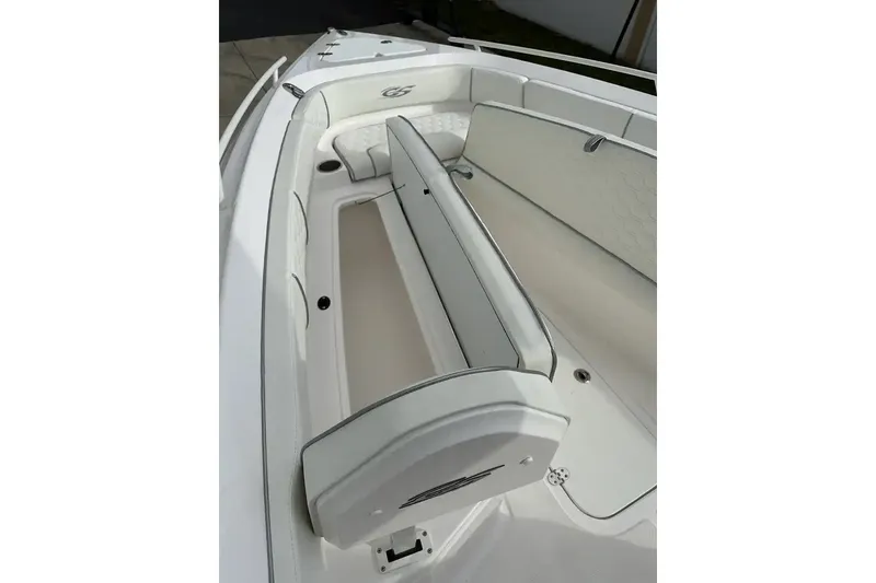 Slide: The Image of 2025 Glasstream 280 Pro-XS boat interior with white seating and sleek design. - 19