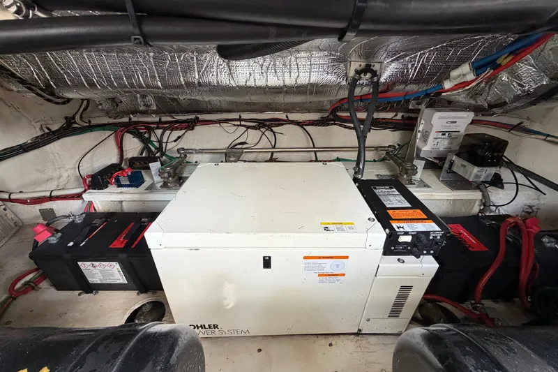 Slide: The Image of Engine room of 2000 Cruisers Yachts 3870 Express with Kohler power system. - 28