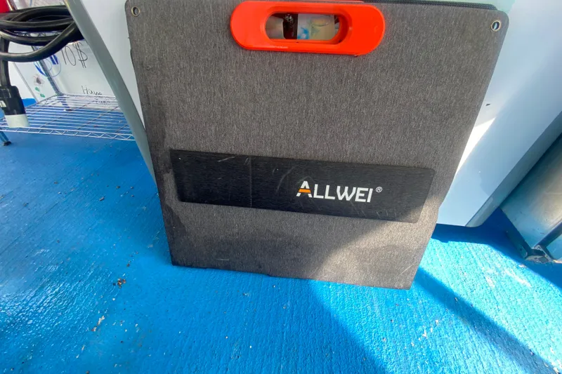 Slide: The Image of Allwei power station on Solid Craft Commercial Pontoon, 2019 model, with blue flooring. - 19