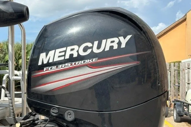 Slide: The Image of Mercury FourStroke engine on 2019 Sun Tracker Fishin' Barge 24 DLX boat. - 14