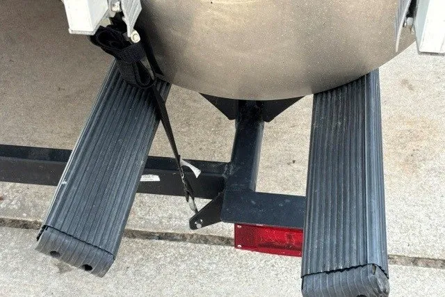 Slide: The Image of 2019 Sun Tracker Fishin' Barge 24 DLX trailer with rubberized support pads. - 13