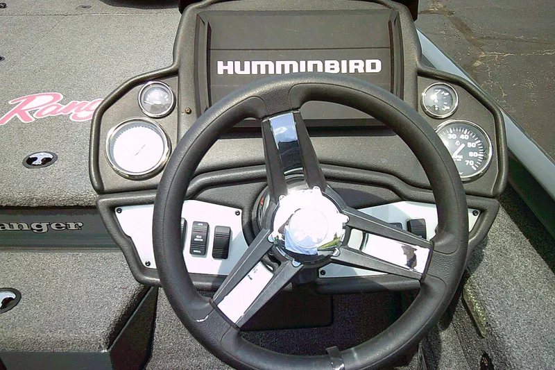 Slide: The Image of Steering console of 2025 Ranger RT198P boat with Humminbird display. - 1