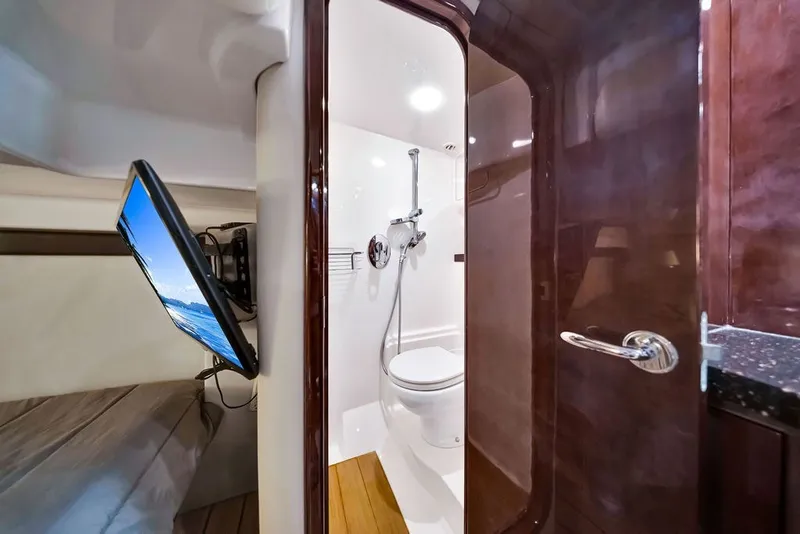 Slide: The Image of Luxurious bathroom and cabin interior of 2014 Regal 42 Sport Coupe yacht. - 21