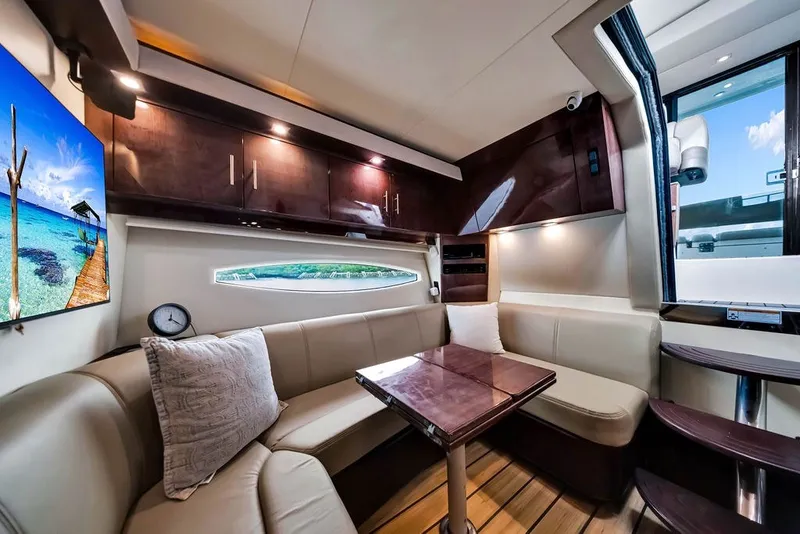 Slide: The Image of Luxurious interior of 2014 Regal 42 Sport Coupe yacht with plush seating and modern decor. - 39