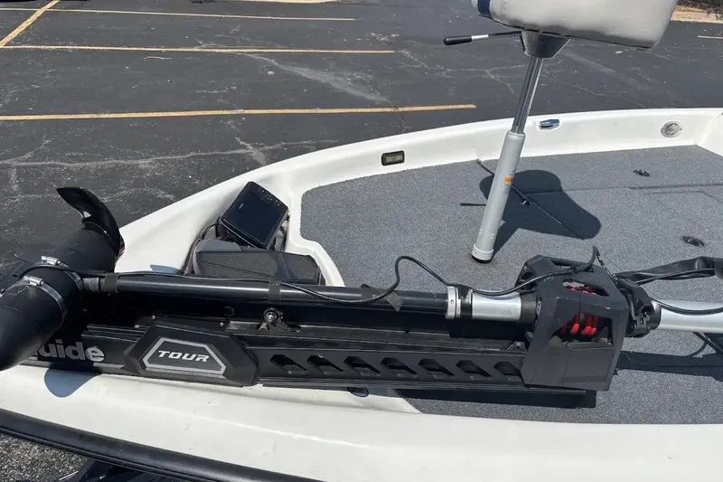 Slide: The Image of 2004 Bass Cat Pantera Classic boat with trolling motor on deck. - 8