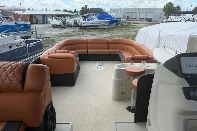 Slide: The Image of 2015 Premier 290 Grand View pontoon boat with spacious seating and modern amenities. - 42