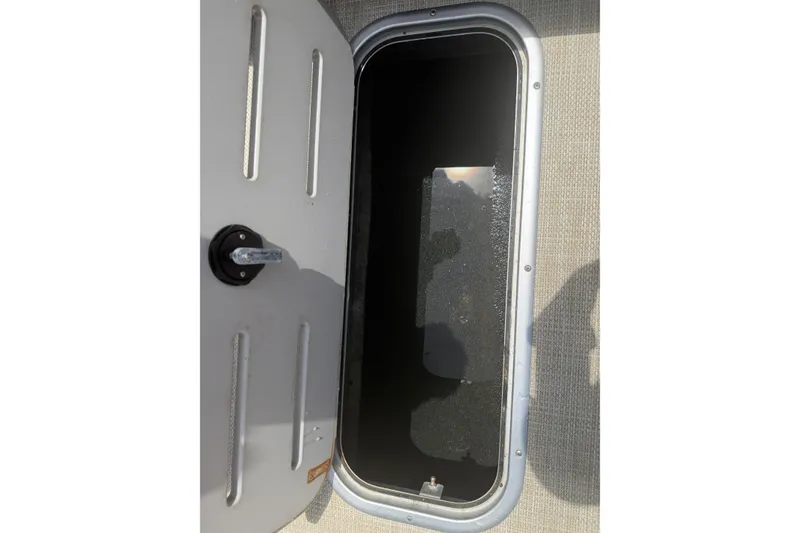 Slide: The Image of Open storage compartment on 2015 Premier 290 Grand View boat. - 80