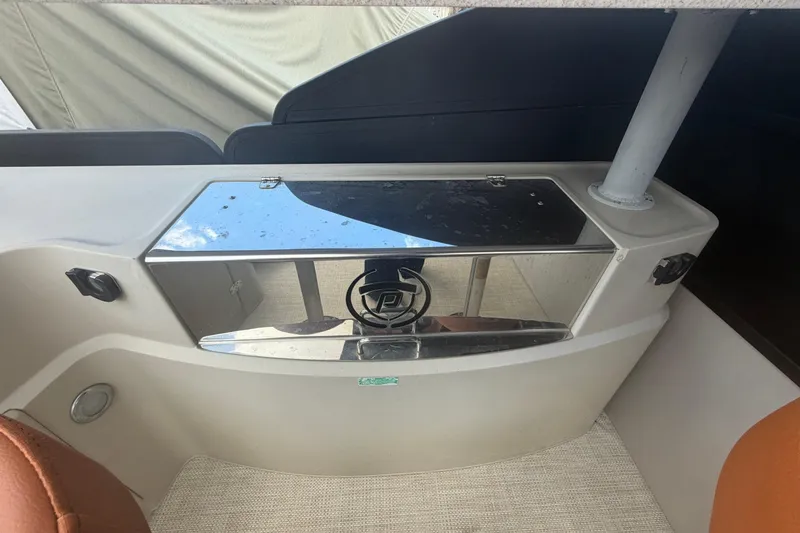 Slide: The Image of Interior view of a 2015 Premier 290 Grand View boat with sleek design elements. - 69