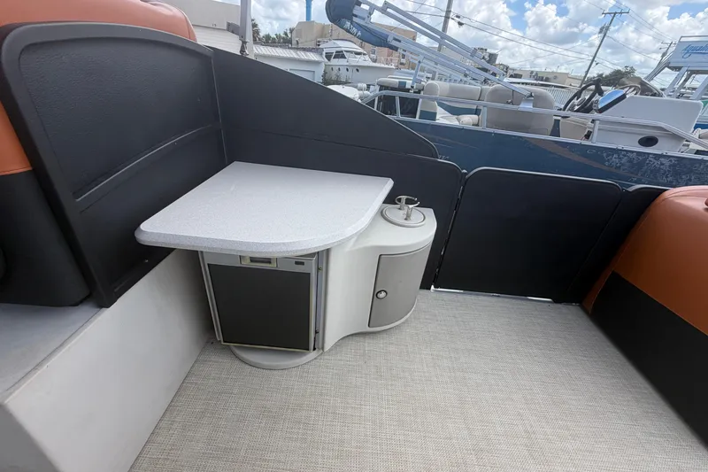Slide: The Image of Interior of 2015 Premier 290 Grand View boat with table and seating area. - 61