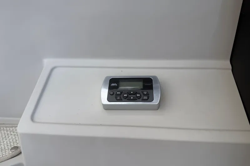 Slide: The Image of Control panel on 2015 Premier 290 Grand View boat dashboard. - 39