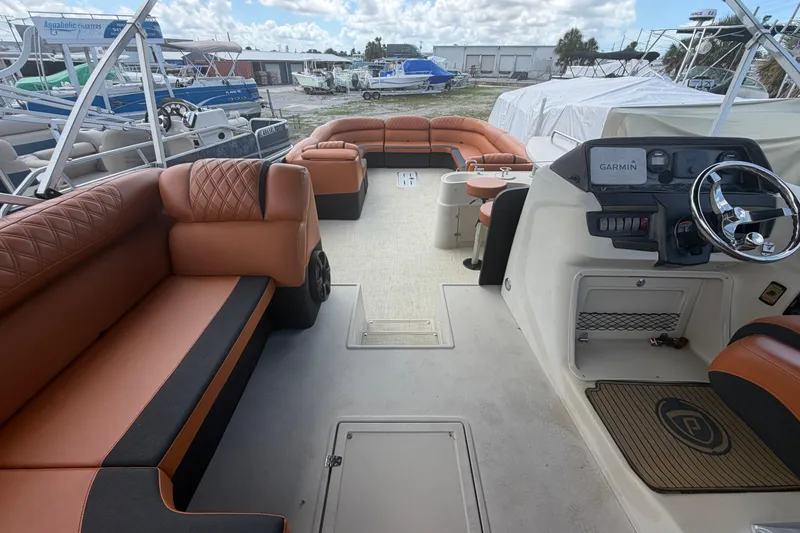 Slide: The Image of 2015 Premier 290 Grand View boat interior with luxurious seating and modern dashboard. - 41