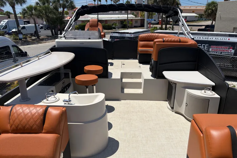 Slide: The Image of Luxurious 2015 Premier 290 Grand View pontoon boat interior with seating and bar area. - 38