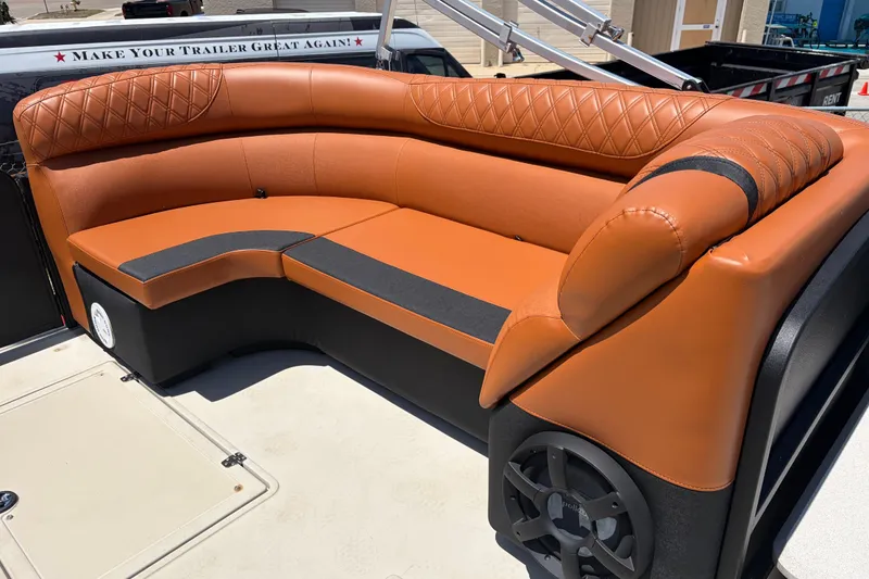 Slide: The Image of Luxurious seating on 2015 Premier 290 Grand View boat with stylish brown upholstery. - 36