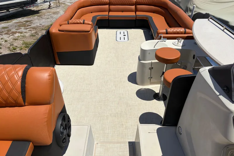 Slide: The Image of Luxurious 2015 Premier 290 Grand View boat interior with plush seating and modern amenities. - 34