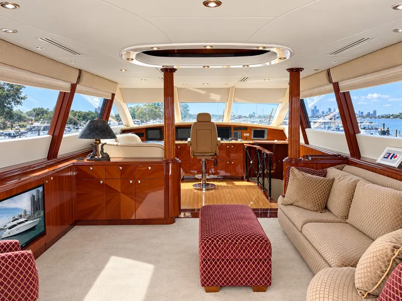 Slide: The Image of Luxurious interior of a 2002 Lazzara 80 Skylounge with elegant furnishings and panoramic views. - 48