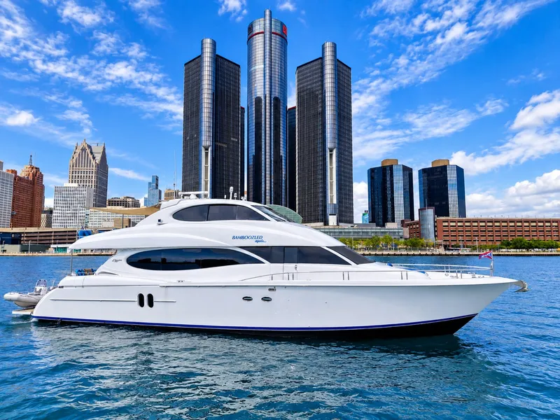 The Image of A luxurious white yacht on the water, set against a modern cityscape with tall buildings. - 0