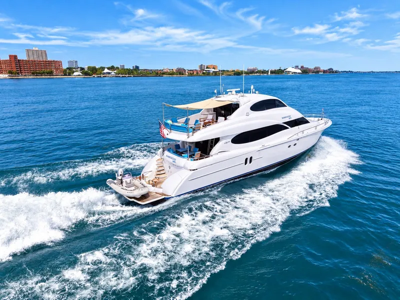 Slide: The Image of A luxurious white yacht cruises on blue water. It features a spacious deck and sleek lines. - 15