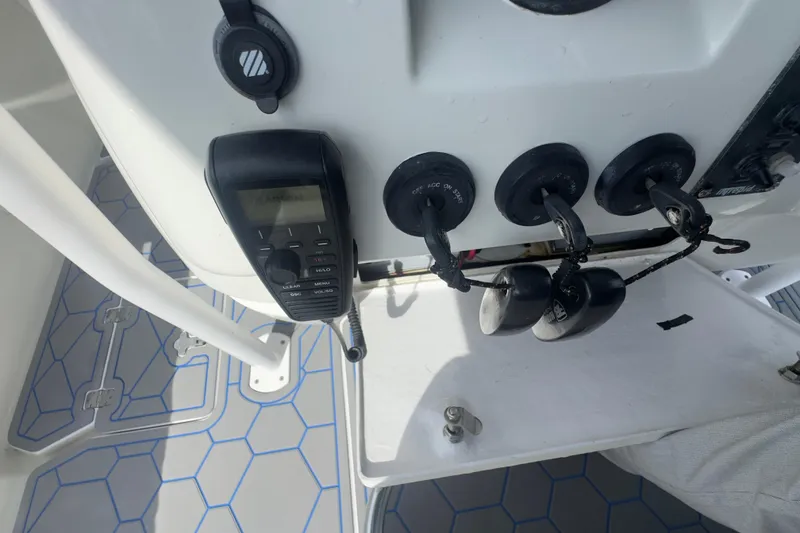 Slide: The Image of 2007 Intrepid 370 Center Console dashboard with marine electronics and controls. - 83