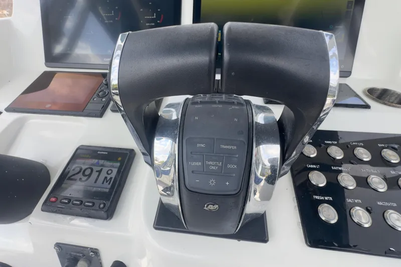 Slide: The Image of Control panel of a 2007 Intrepid 370 Center Console boat with navigation instruments. - 79