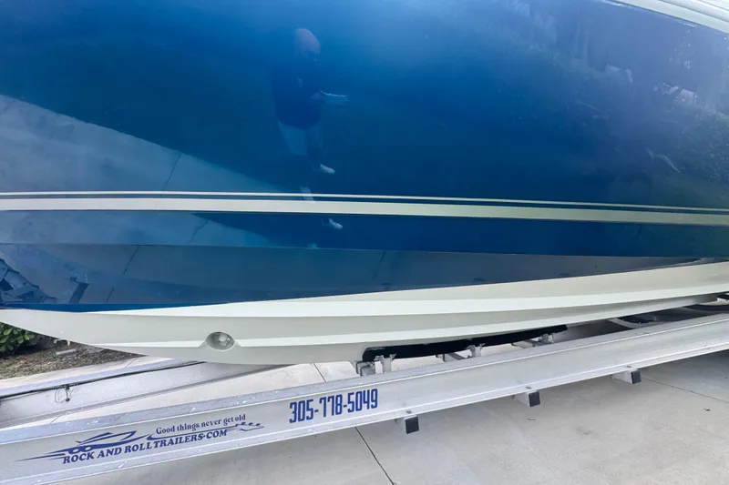 Slide: The Image of 2007 Intrepid 370 Center Console boat on trailer, side view. - 24
