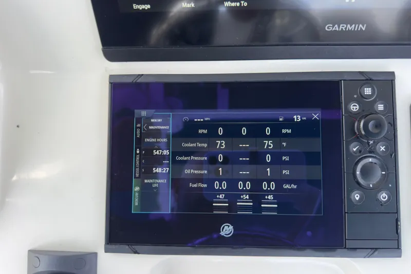 Slide: The Image of Digital display on 2007 Intrepid 370 Center Console showing engine metrics and controls. - 73