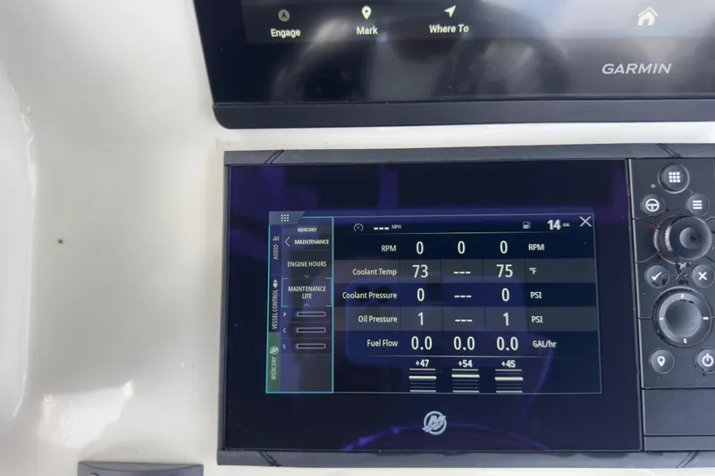 Slide: The Image of Digital display on a 2007 Intrepid 370 Center Console boat showing engine metrics. - 74