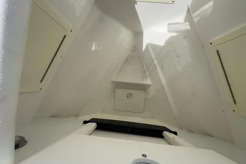 Slide: The Image of Interior view of a 2007 Intrepid 370 Center Console boat cabin. - 48