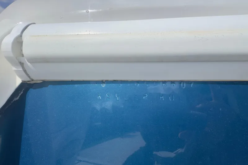 Slide: The Image of Close-up of a 2007 Intrepid 370 Center Console boat's hull identification number. - 27