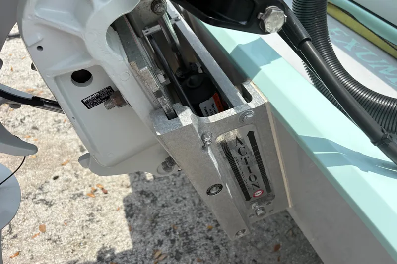 Slide: The Image of Close-up of 2024 Exuma 22 boat engine mount and hydraulic system. - 28