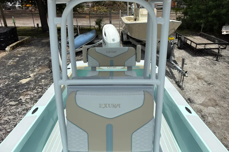 Slide: The Image of 2024 Exuma 22 boat interior with branded seating and sleek design. - 25