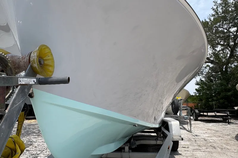Slide: The Image of 2024 Exuma 22 boat on trailer, close-up view of hull and bow. - 9