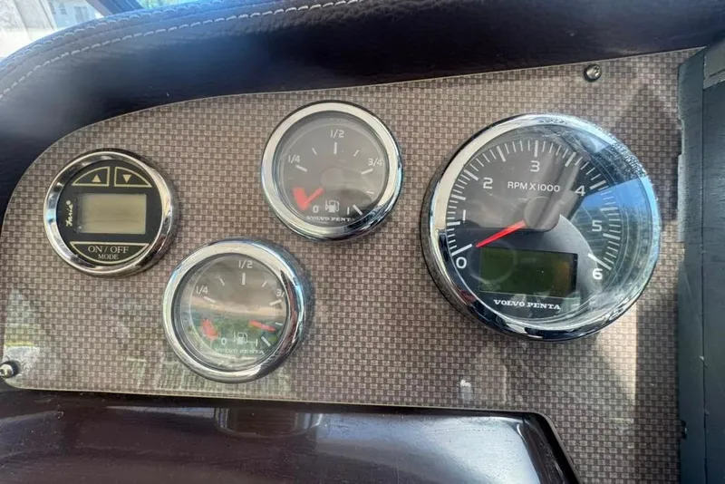 Slide: The Image of Dashboard of a 2015 Regal 35 Sport Coupe with Volvo Penta gauges. - 75