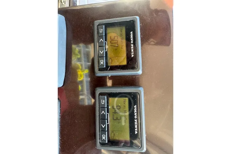 Slide: The Image of Control panel of a 2015 Regal 35 Sport Coupe with Volvo Penta displays. - 84