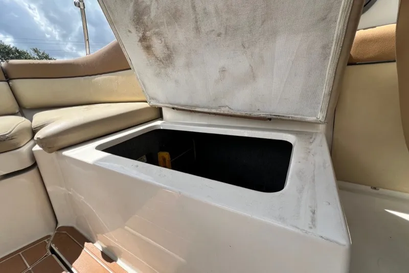 Slide: The Image of Open storage compartment on a 2007 Sea Ray 260 Sundeck boat. - 30