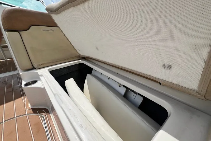 Slide: The Image of Open storage compartment on 2007 Sea Ray 260 Sundeck boat, showcasing interior space. - 42