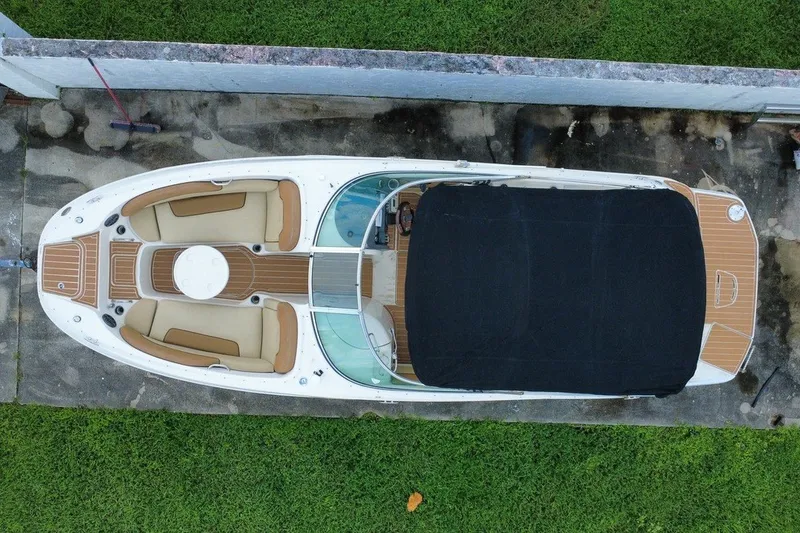 Slide: The Image of Top view of a 2007 Sea Ray 260 Sundeck boat with covered seating area. - 7