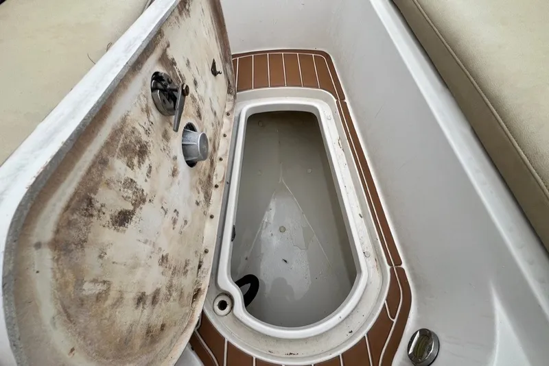 Slide: The Image of Open storage compartment on a 2007 Sea Ray 260 Sundeck boat. - 53