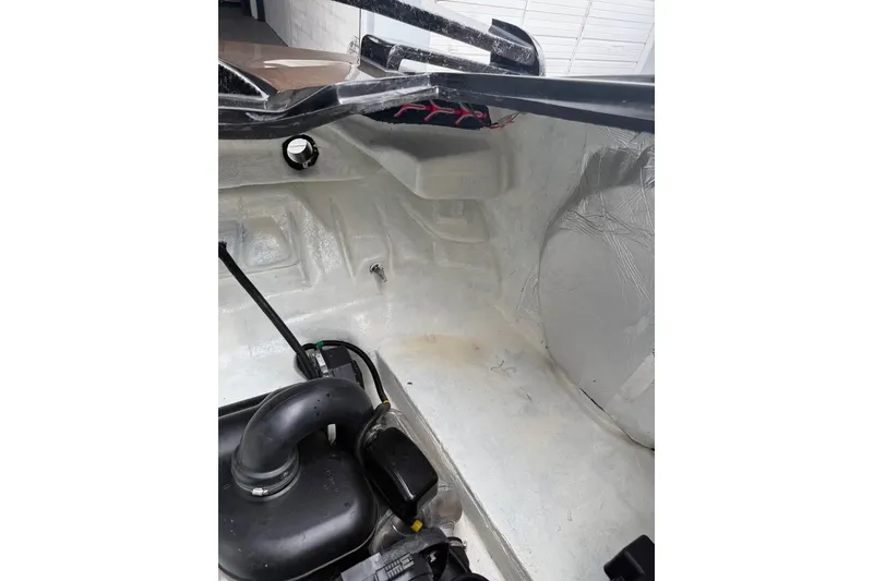 Slide: The Image of Interior view of 2026 Watersports Car JetCar, showcasing engine compartment details. - 14