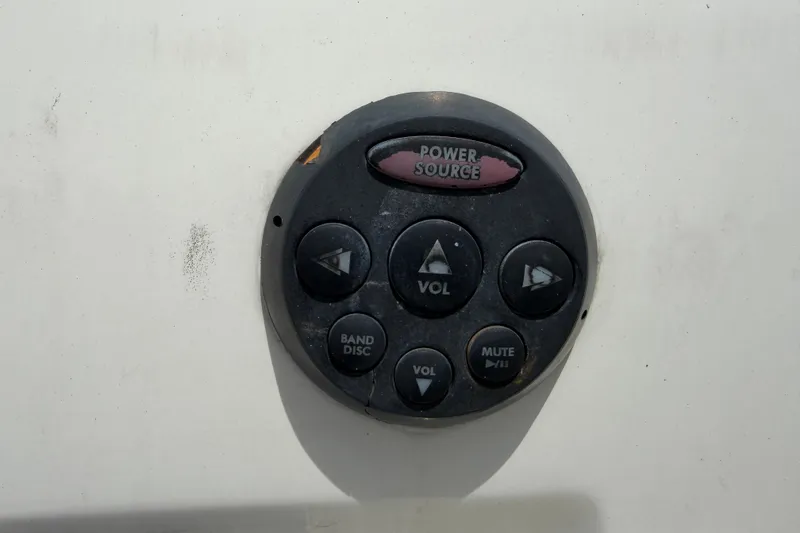 Slide: The Image of Audio control panel on a 2007 Sea Ray SLX 250 boat. - 16